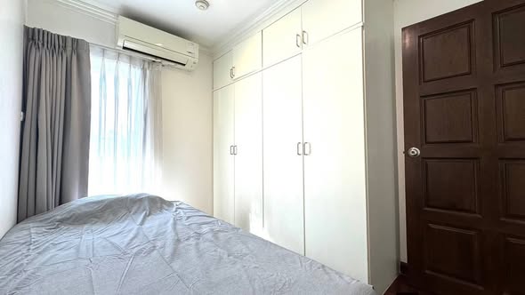bedroom of Richmond Palace Condominium