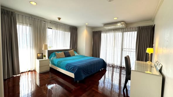 bedroom of Richmond Palace Condominium