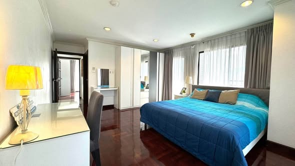 bedroom of Richmond Palace Condominium