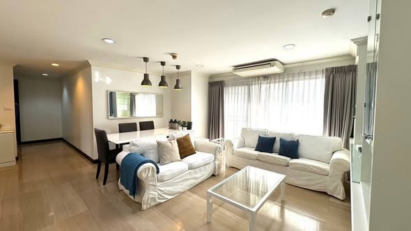 bedroom and living room of Richmond Palace Condominium