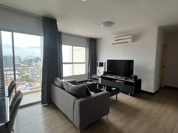 bedroom and living room of S&S Sukhumvit Condominium
