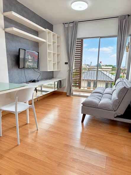 living room and bedroom of S&S Sukhumvit Condominium