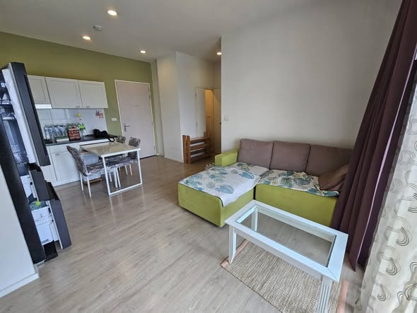 bedroom and living room of S1 Rama 9 Condominium