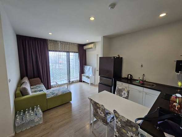 bedroom and living room of S1 Rama 9 Condominium