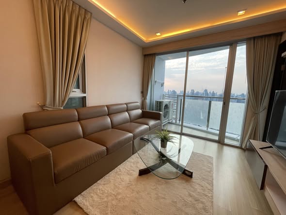 living room and bedroom of Sky Walk Residences
