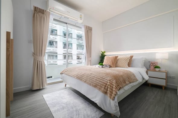 bedroom of Studio One Condo