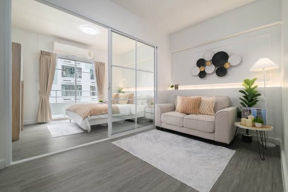 living room and bedroom of Studio One Condo