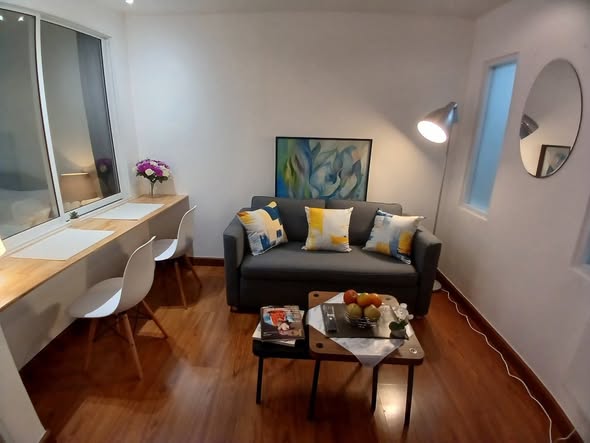 bedroom and living room of Surawong City Resort