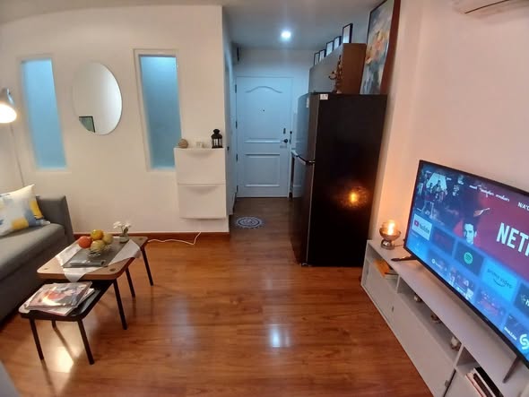 living room and bedroom of Surawong City Resort