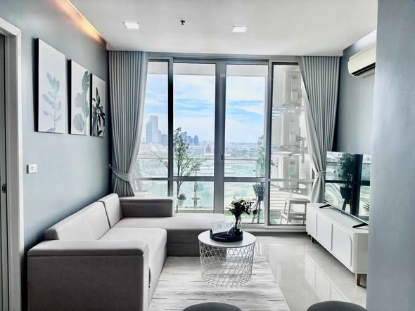 bedroom and living room of TC-Green Condominium