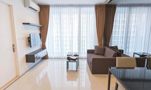 bedroom and living room of TC-Green Condominium