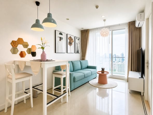 living room and bedroom of TC-Green Condominium