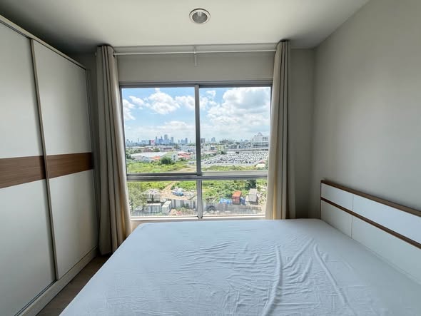 bedroom of Tempo One Condo