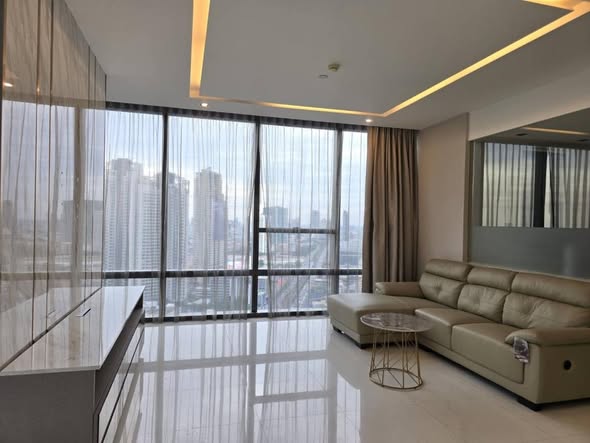 bedroom and living room of The Bangkok Sathorn