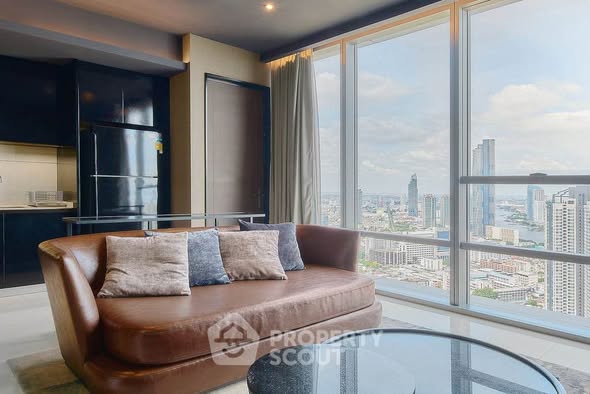 bedroom and living room of The Bangkok Sathorn