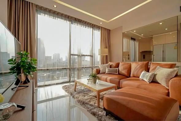bedroom and living room of The Bangkok Sathorn