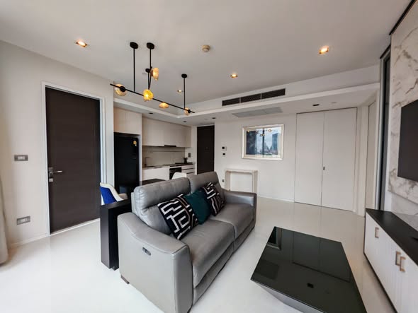 bedroom and living room of The Bangkok Sathorn