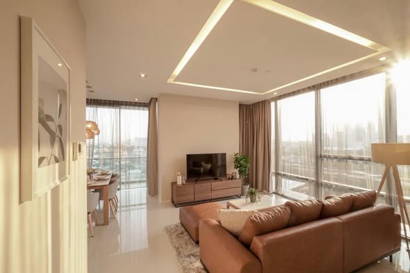 living room and bedroom of The Bangkok Sathorn