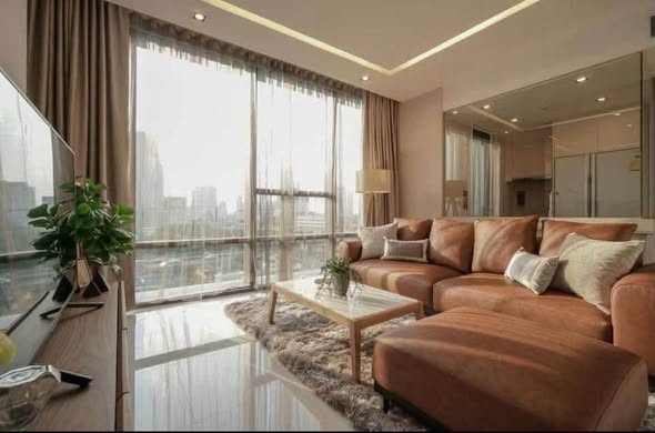 living room and bedroom of The Bangkok Sathorn
