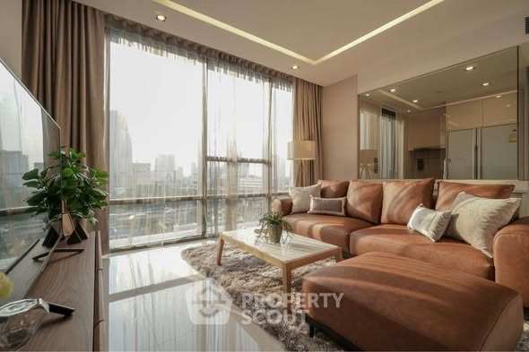 living room and bedroom of The Bangkok Sathorn