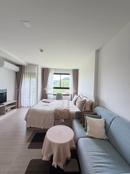 living room and bedroom of The Base Bukit Phuket เดอะ เบส บูกิต ภูเก็ต
