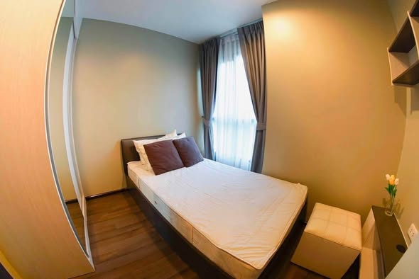 bedroom of THE BASE Park West – Sukhumvit 77