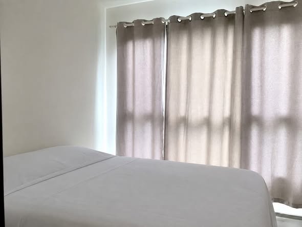 bedroom of THE BASE Park West – Sukhumvit 77