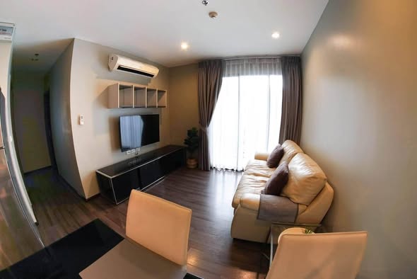 bedroom and living room of THE BASE Park West – Sukhumvit 77