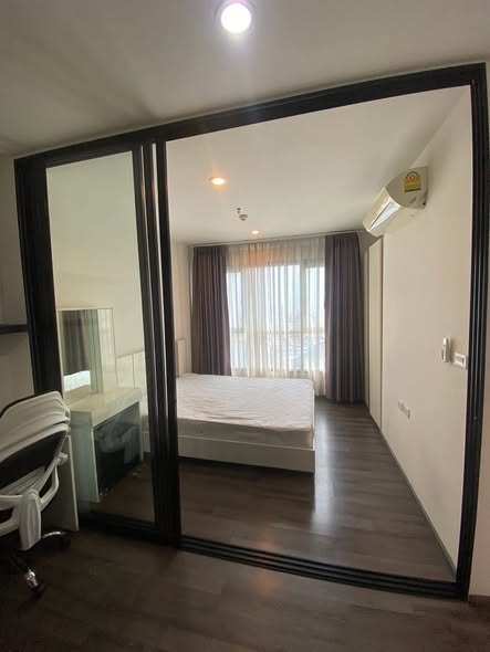 bedroom and room interior of THE BASE Park West – Sukhumvit 77