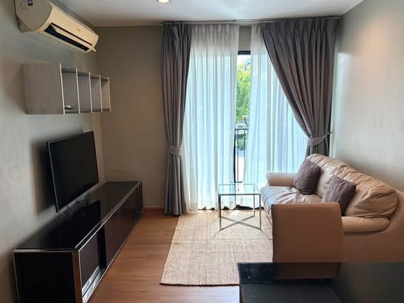 living room and bedroom of THE BASE Park West – Sukhumvit 77