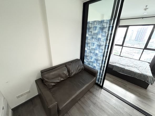 living room and room interior of THE BASE Park West – Sukhumvit 77