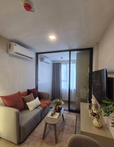 living room and bedroom of The Base Ratchada 19