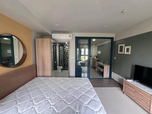 bedroom and room interior of THE BASE Sukhumvit 50