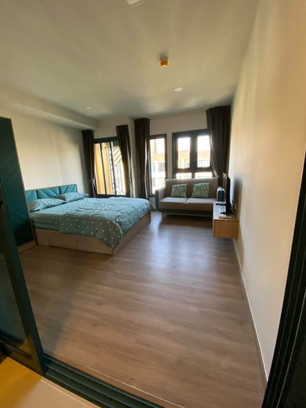 bedroom and room interior of THE BASE Sukhumvit 50