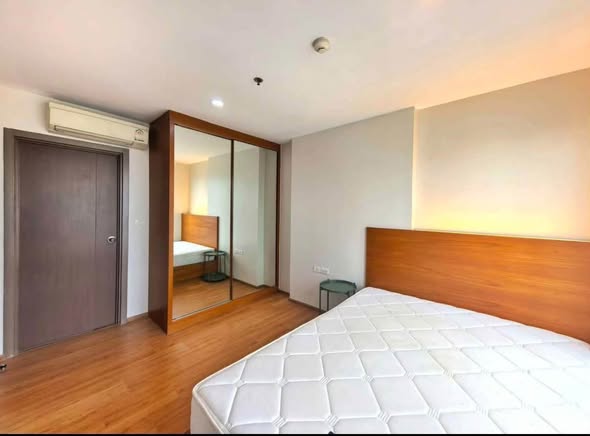 bedroom and room interior of THE BASE Sukhumvit 77