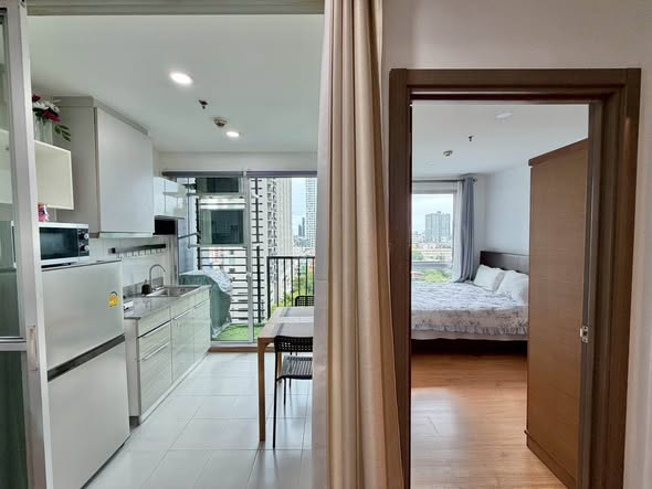 bedroom and room interior of THE BASE Sukhumvit 77