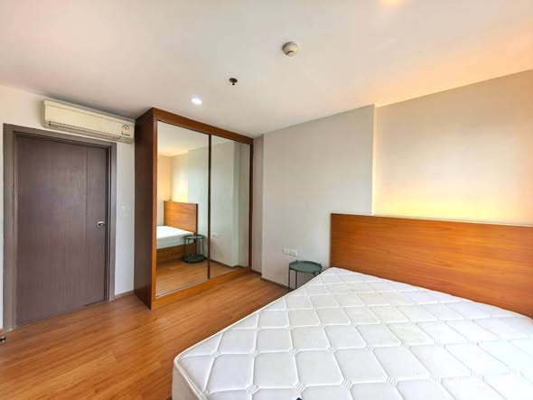 bedroom and room interior of THE BASE Sukhumvit 77