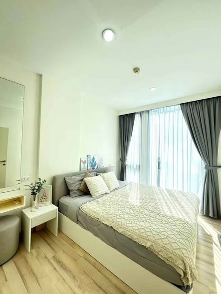 bedroom of The Base Uptown Condo