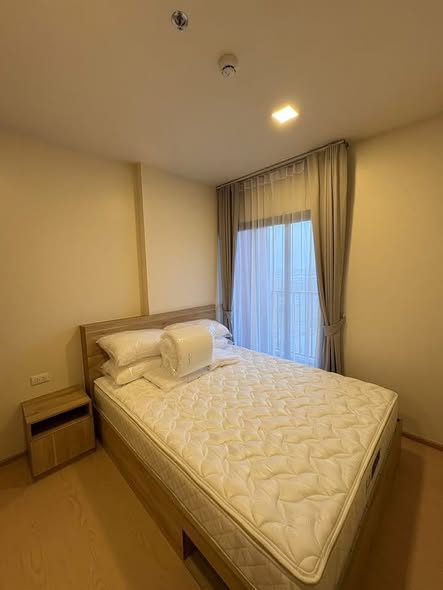 bedroom of The Base Urban Rama9