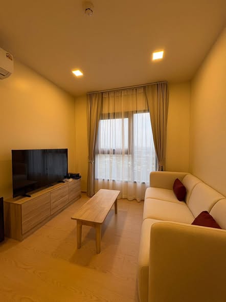 living room and bedroom of The Base Urban Rama9