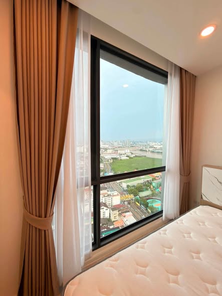 bedroom and room interior of The Clev Riverline Chaophraya – Wong Sawang