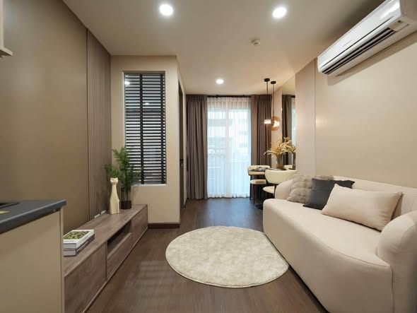 bedroom and living room of The Clover