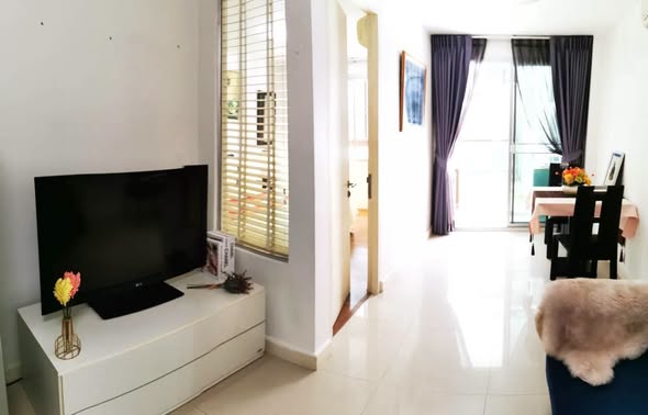 bedroom and living room of The Clover