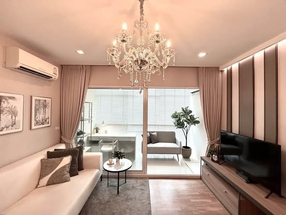 bedroom and living room of The Coast Bangkok