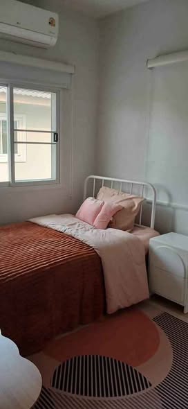 bedroom of The Corner House Bangkok