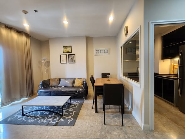 bedroom and living room of The Crest Sukhumvit 34