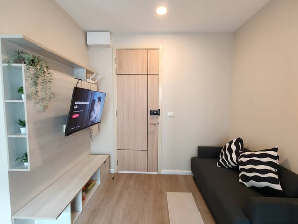 living room and bedroom of The Cube Plus Phahonyothin 56