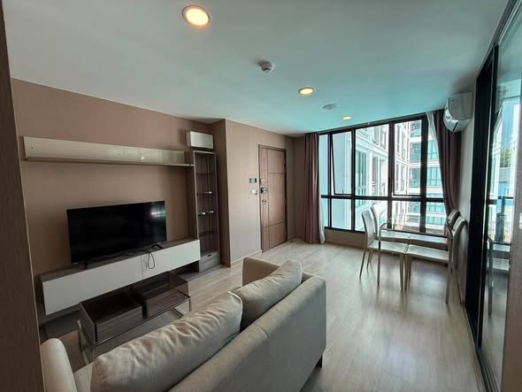 living room and bedroom of The Cube Urban Sathon – Chan