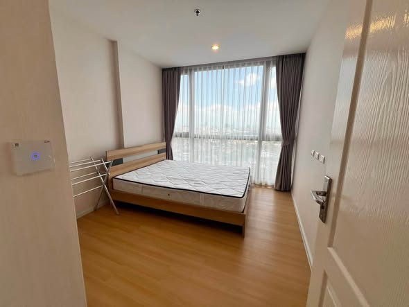 bedroom of The Cuvee Tiwanon