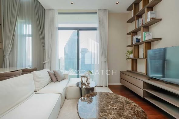 bedroom and living room of The Diplomat 39